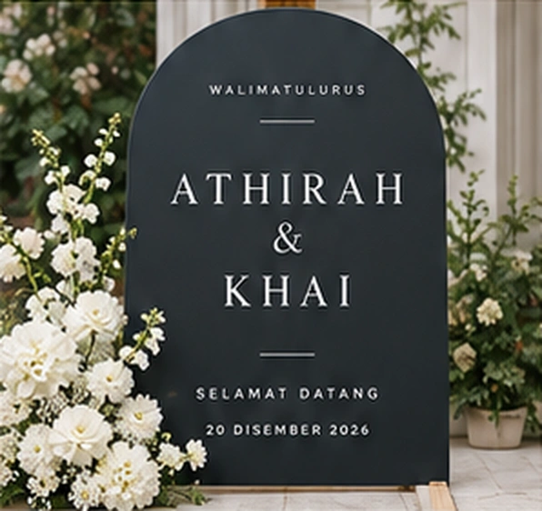 Matching charcoal arch welcome board