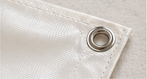 Tarpaulin hem and eyelet close-up